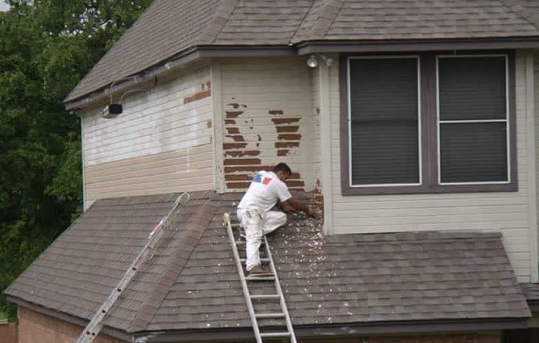 this home needed to be scraped a bunch in order to prime it for our Sherman Williams paint.