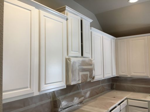 Painted White Cabinets with Dark Grey Walls